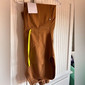 Figs scrub jumpsuit in the color Earth, size Large.